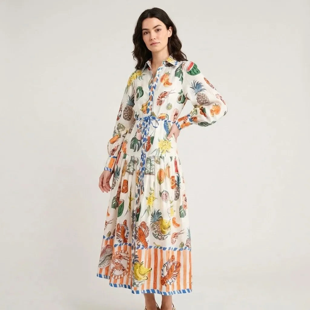 Vestido midi fluido com estampado artístico | Corte cintado | Elegância criativa
