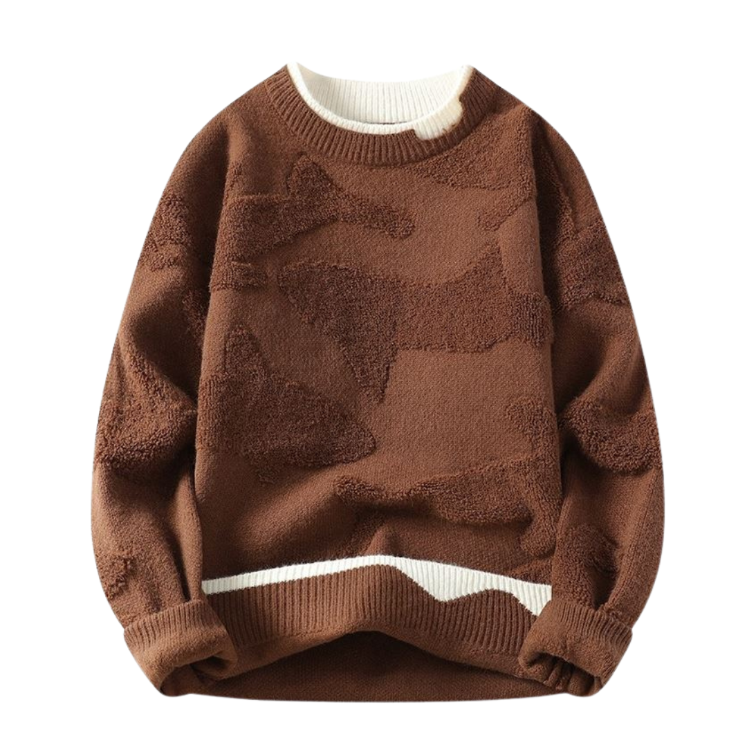 Svetr s texturovaným vzorem v abstraktním stylu