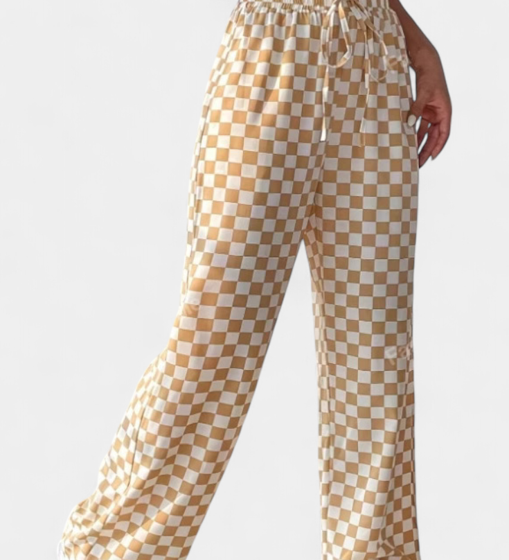 Hilaria Kalhoty s Širokými Nohavicemi a Kostkovaným Vzorem